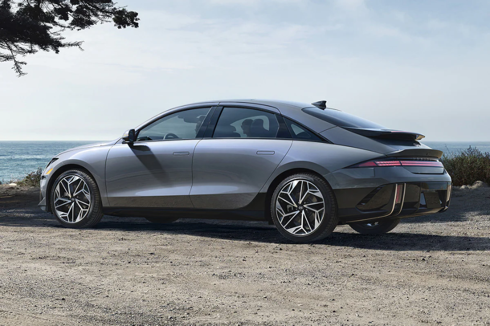 Side profile of the 2026 Hyundai IONIQ 6 by the coast, highlighting its smooth curves and aerodynamic silhouette
