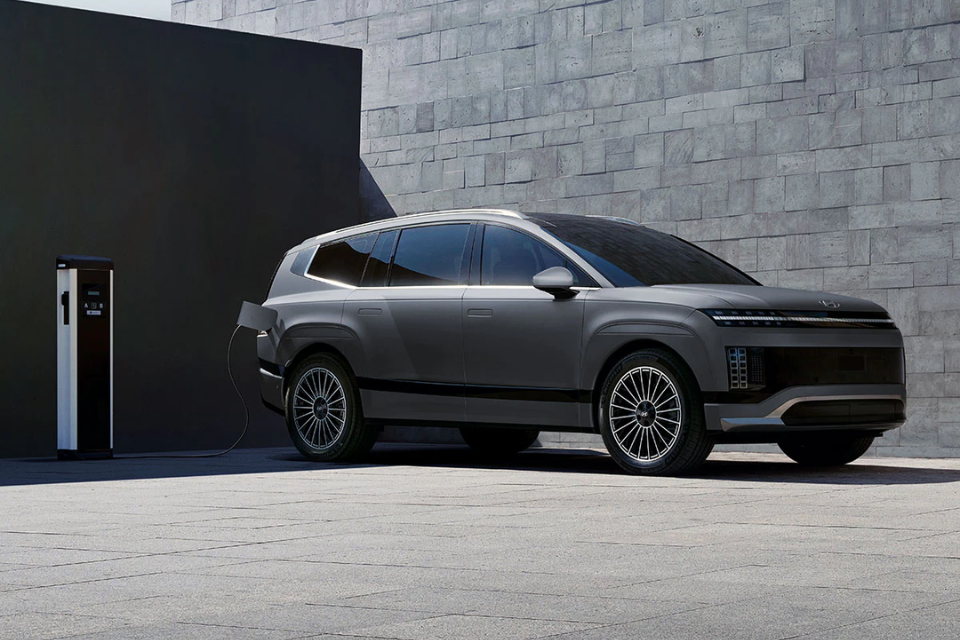 2026 Hyundai IONIQ 9 plugged into a charging station, representing its all-electric capability and modern efficiency