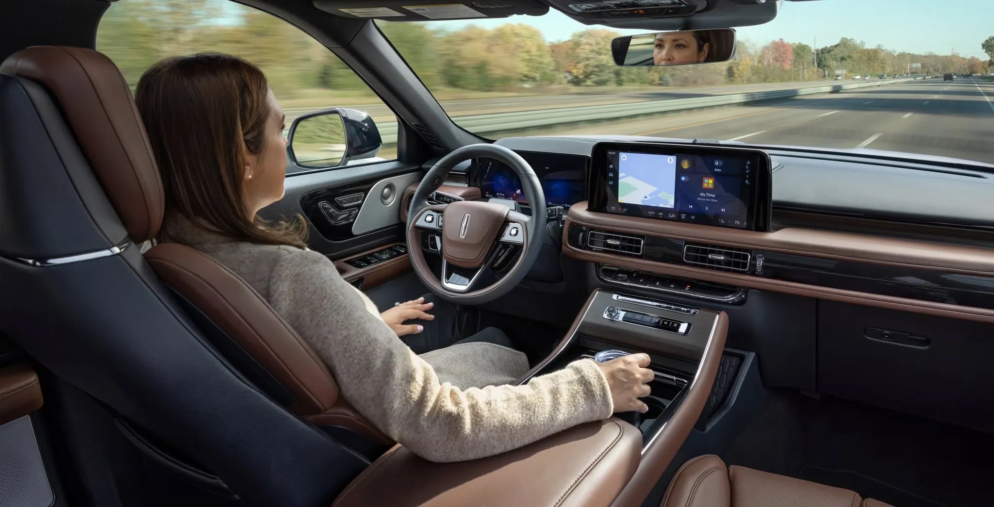 2026 Lincoln Aviator driver enjoying premium leather interior and digital display cockpit