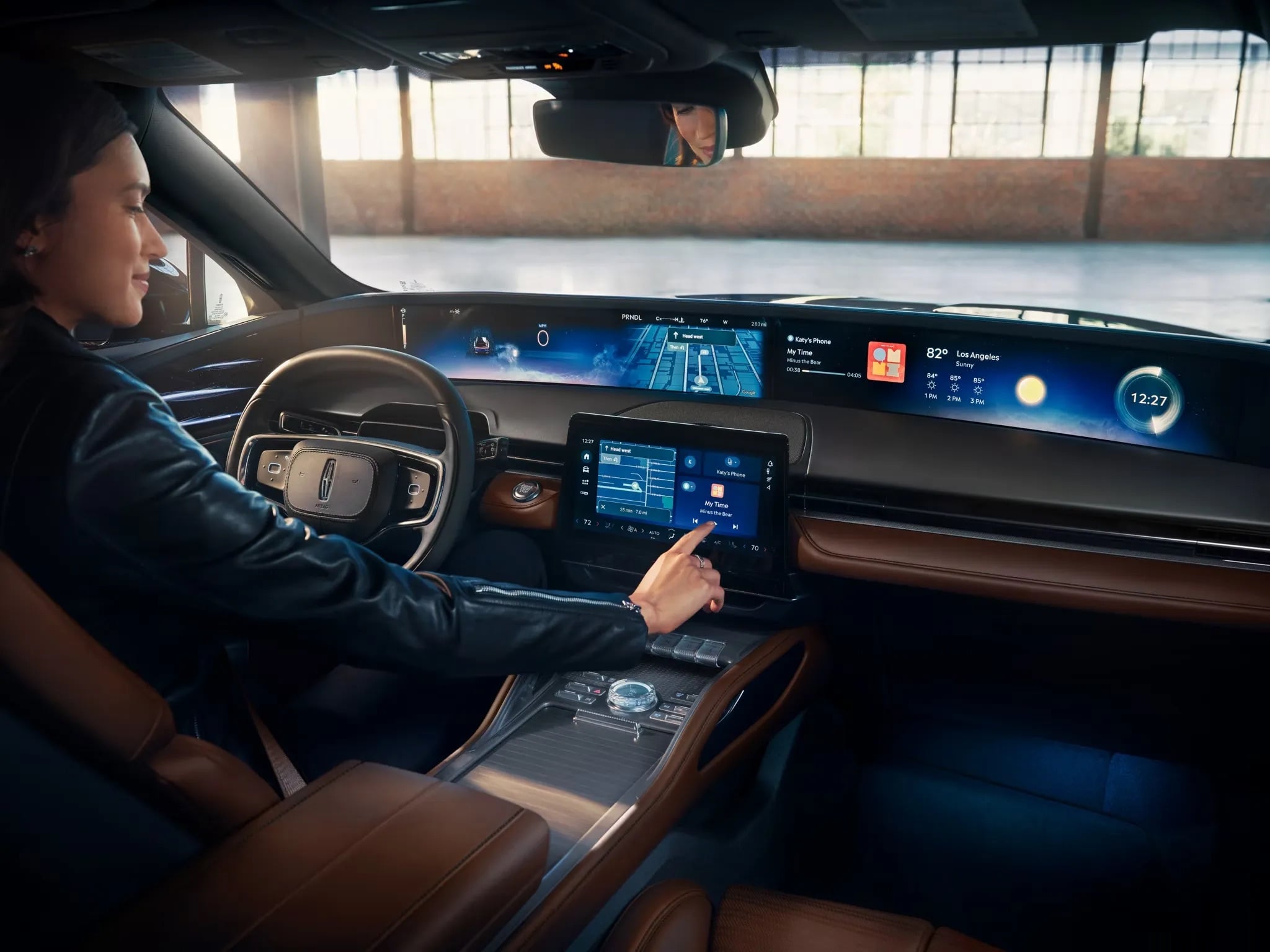 2026 Lincoln Nautilus driver interacting with panoramic digital dashboard display
