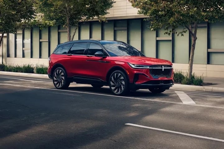2026 Lincoln Nautilus red luxury SUV parked on city street exterior view