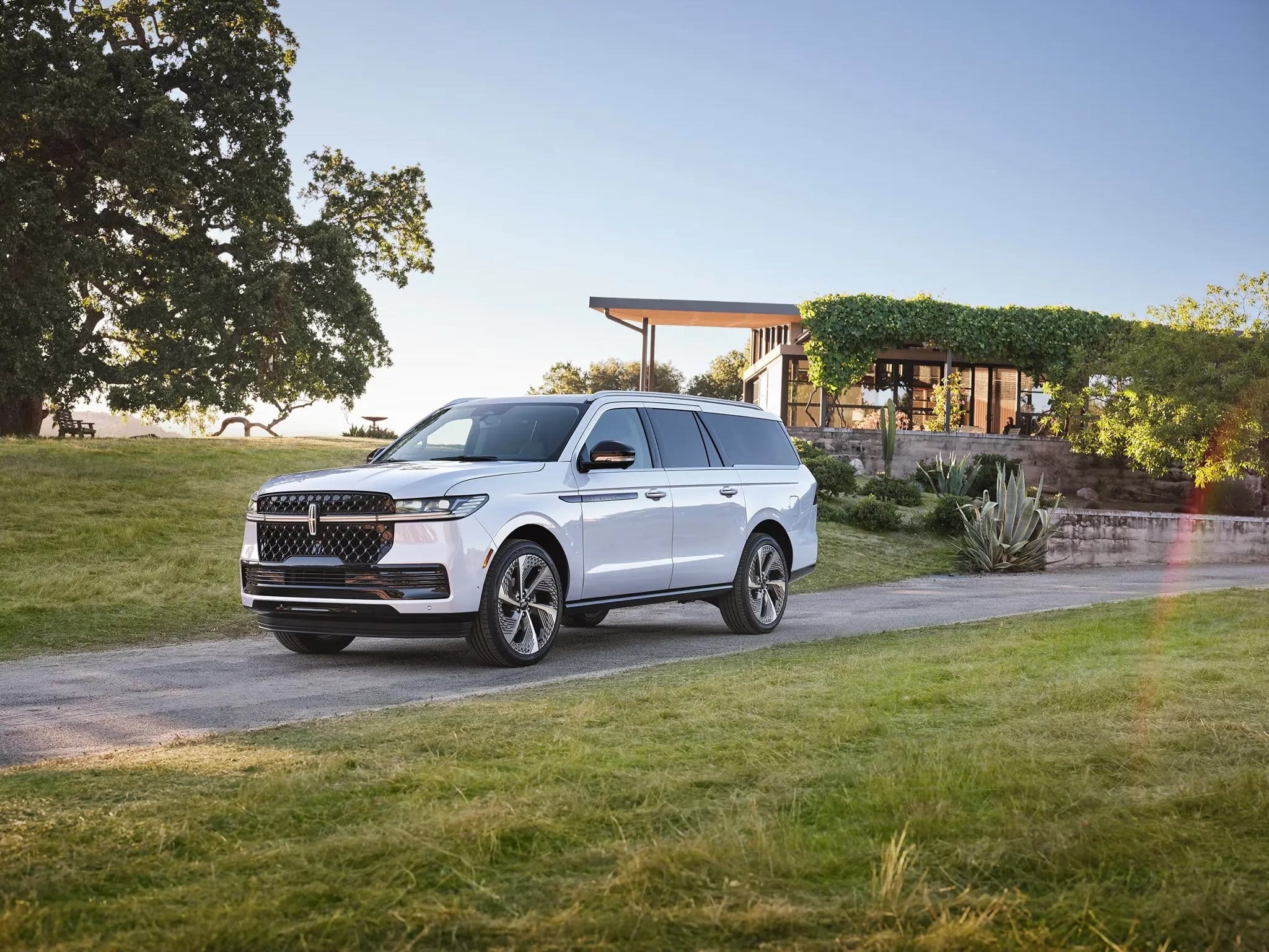 2026 Lincoln Navigator luxury SUV parked on golf course landscape