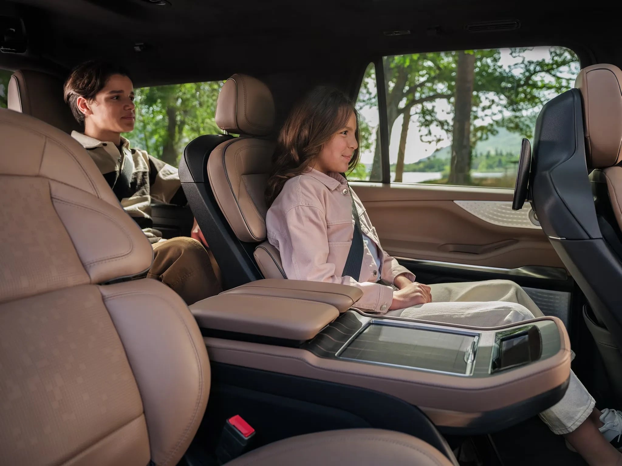 2026 Lincoln Navigator luxury second row seating with passengers enjoying spacious interior
