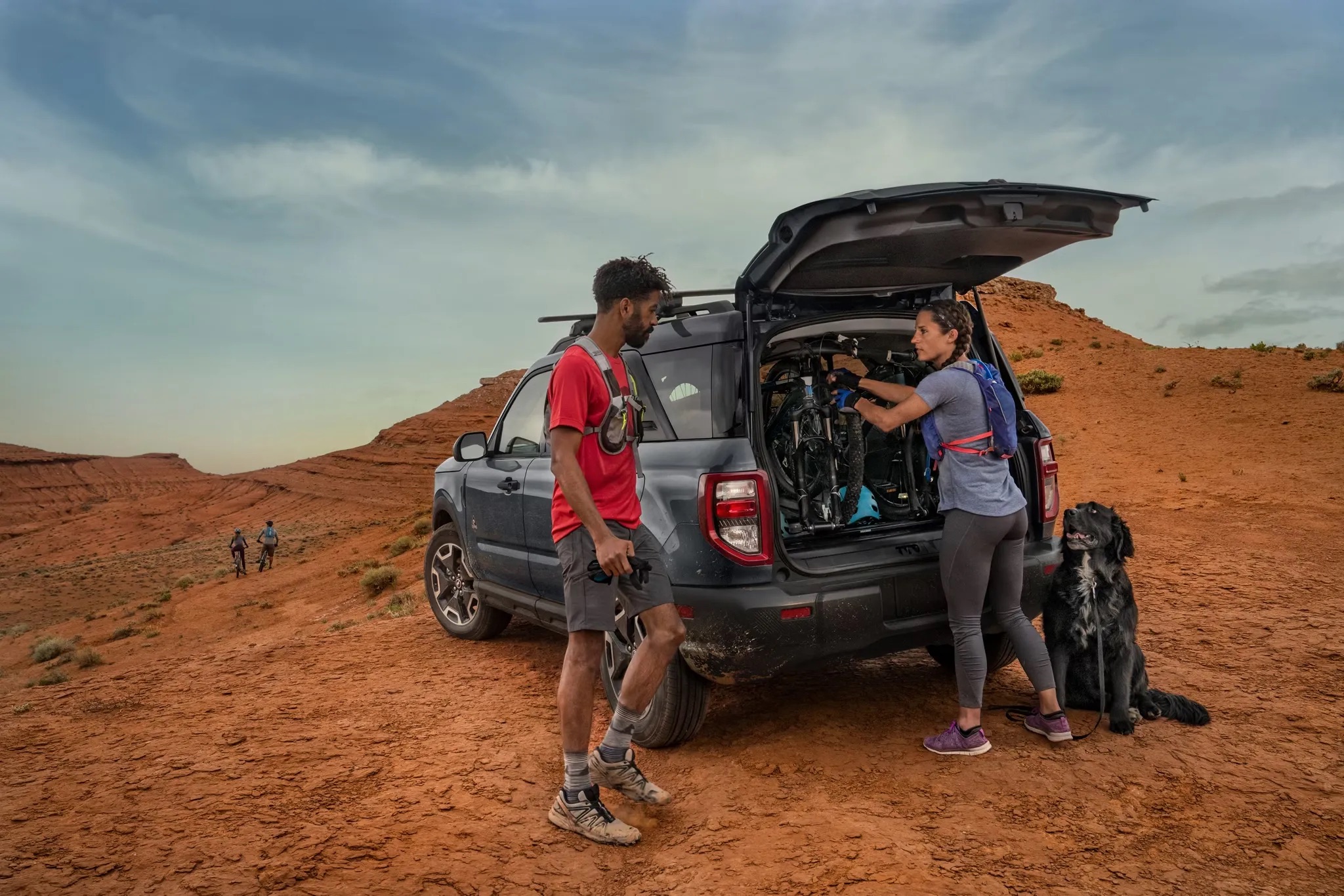 People loading gear into the rear of a 2026 Ford Bronco Sport