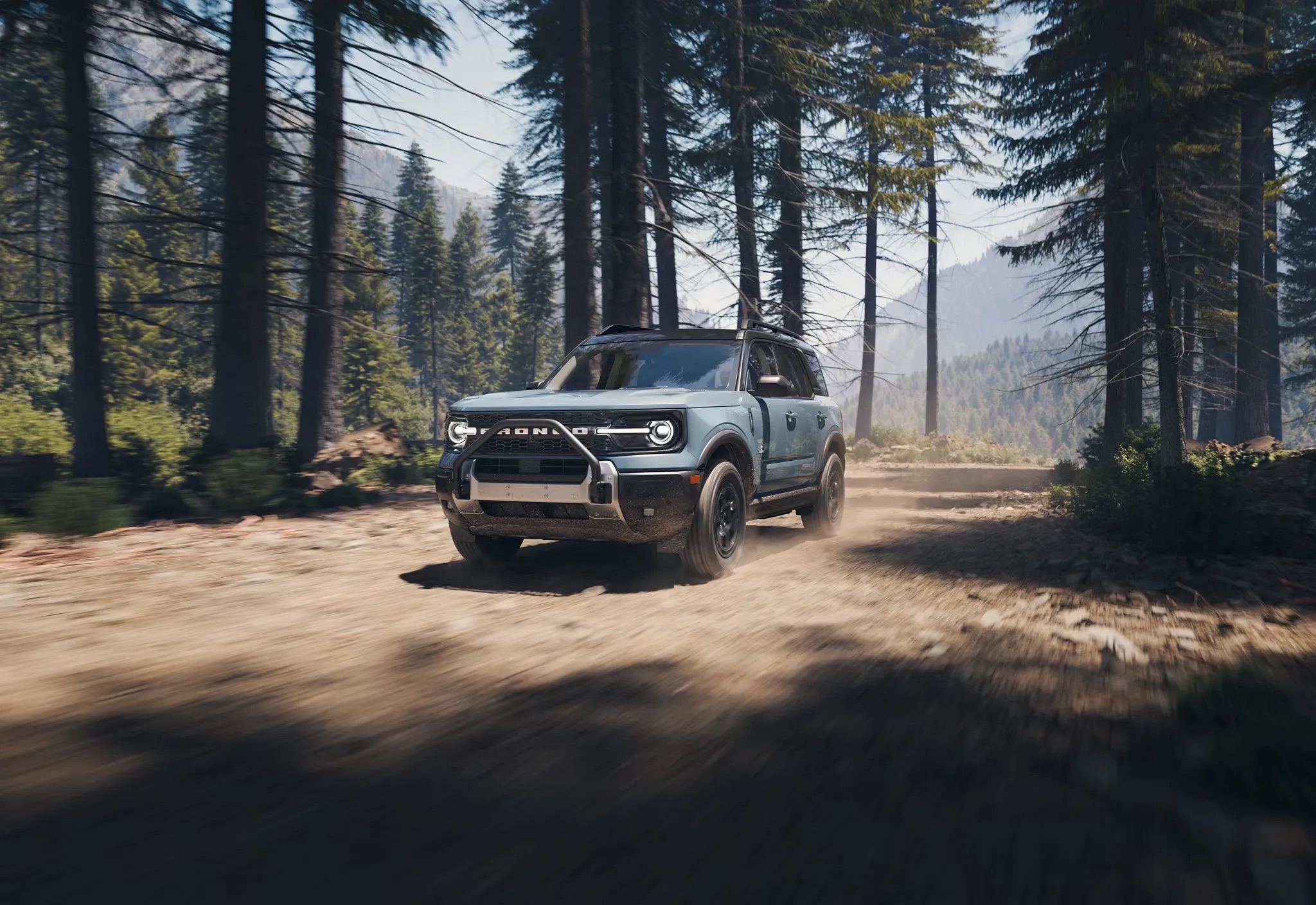 2026 Ford Bronco Sport driving along a forest trail