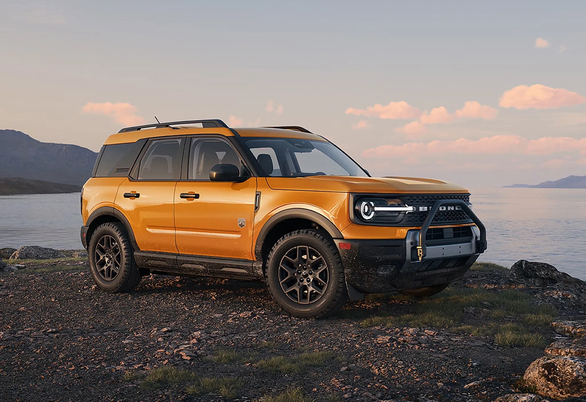 Yellow 2026 Ford Bronco Sport parked outdoors at sunset