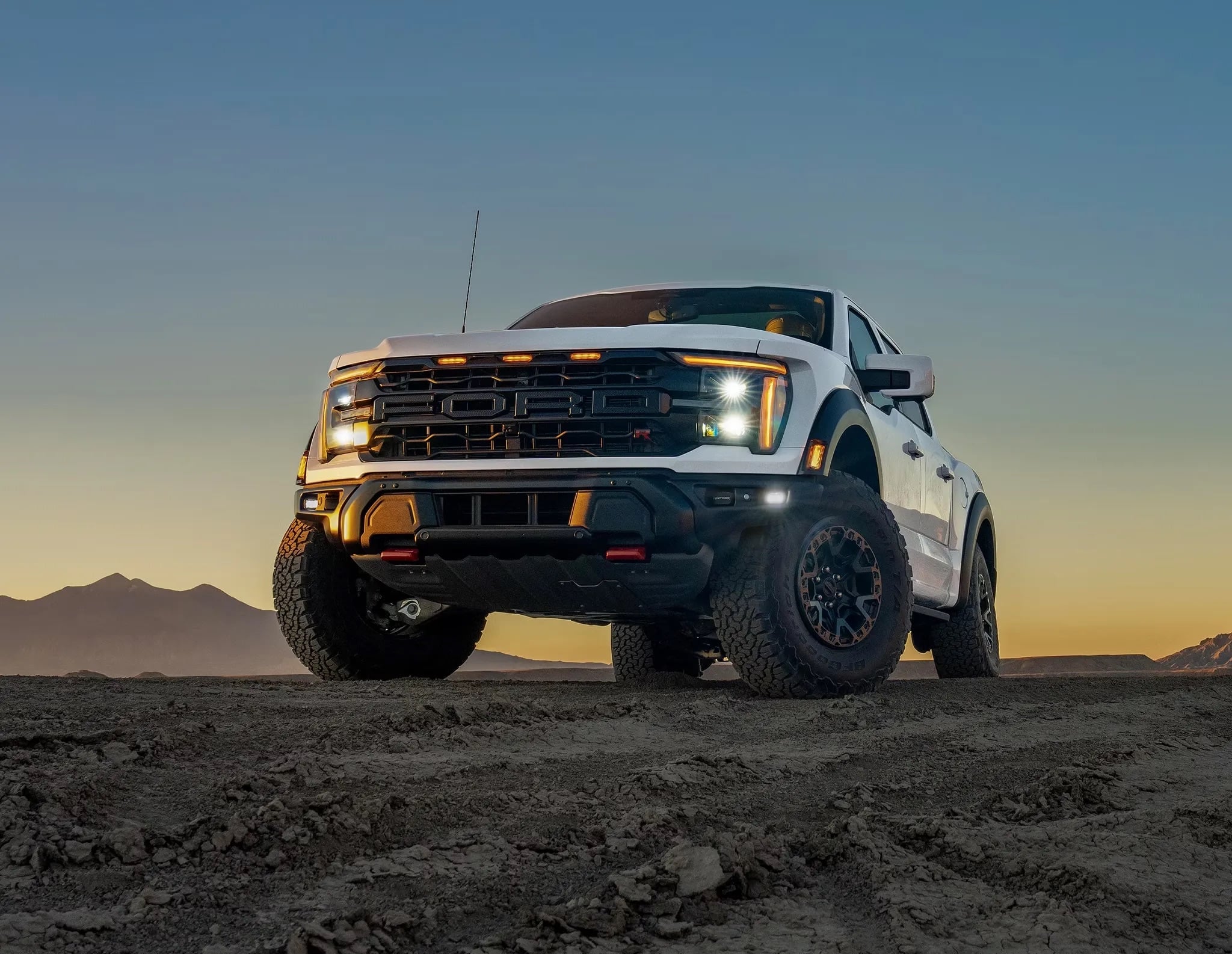 Front three-quarter view of the 2026 Ford F-150 parked on dirt