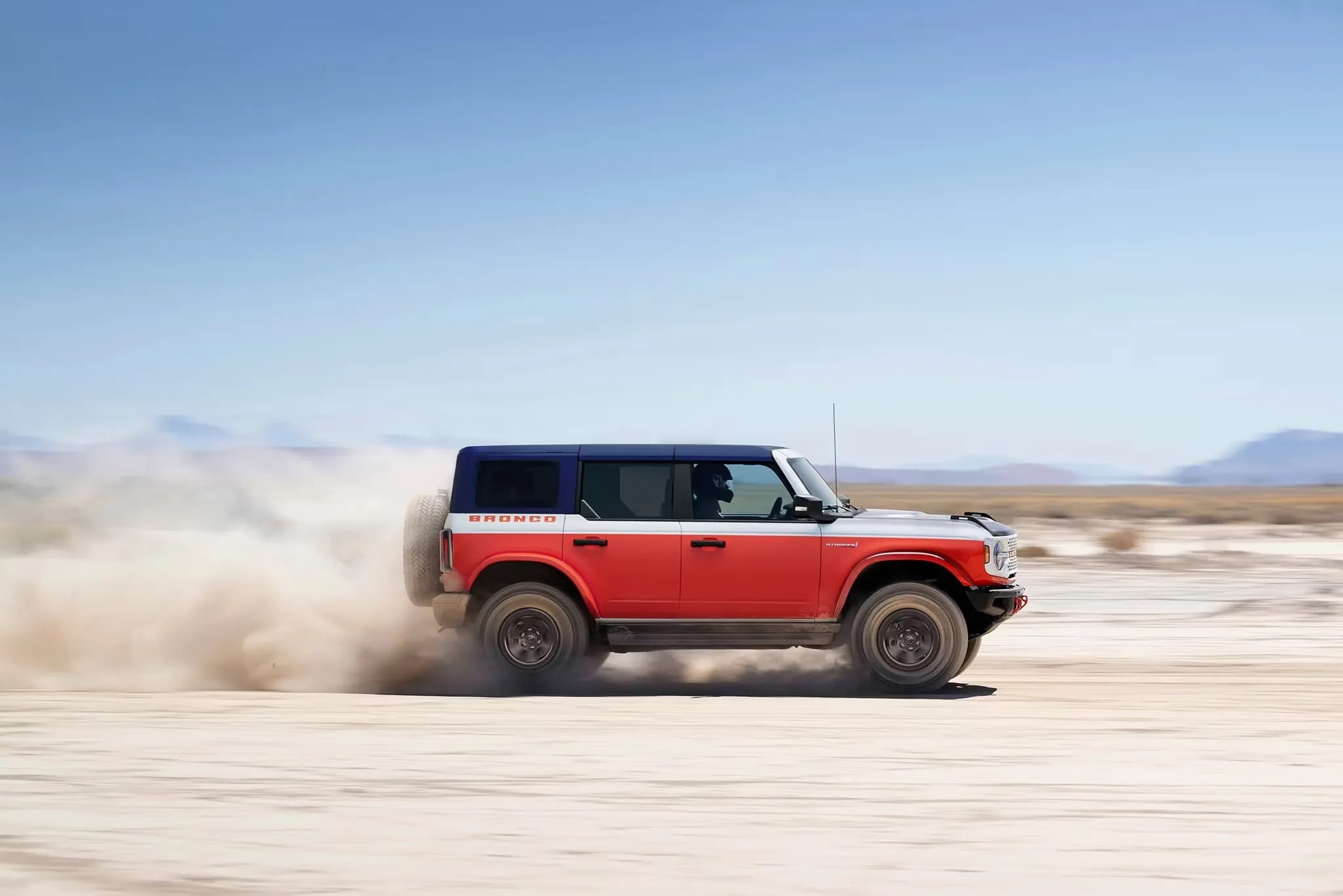 2026 Bronco Heritage showcasing Off-Road capabilities in a sand covered terrain