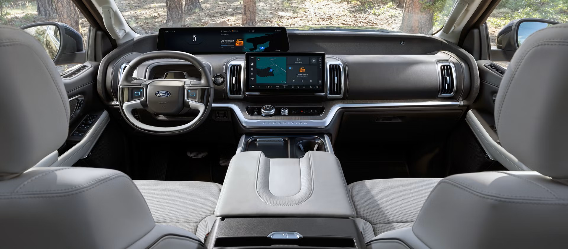 2026 Ford Expedition interior in grey, highlighting spacious seating, modern dashboard layout, and advanced technology features.