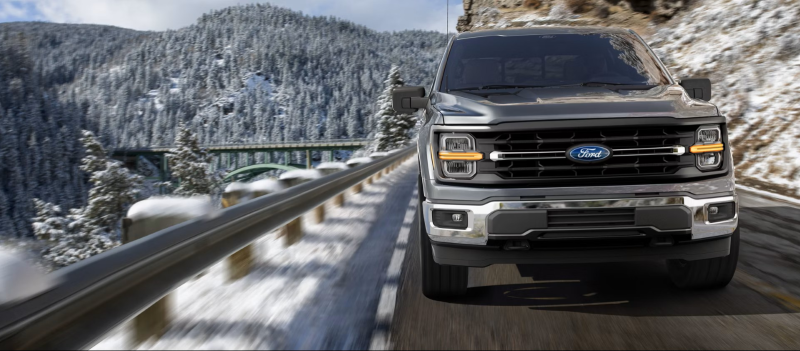 Ford F-150 driving down a mountain highway