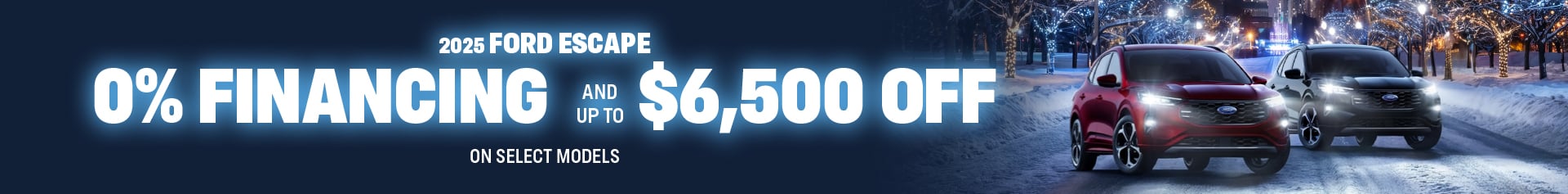 A red Ford Escape and a silver Ford Escape appear on a snowy urban road at night, surrounded by lit trees and high rise buildings. The promotion reads zero percent financing OAC and up to sixty five hundred dollars off select models.