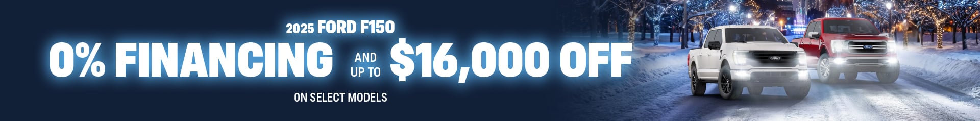 A white Ford F 150 and a red F 150 sit on a snowy night street lined with glowing winter lights and a large city skyline. The offer includes zero percent financing OAC and up to sixteen thousand dollars off select models.