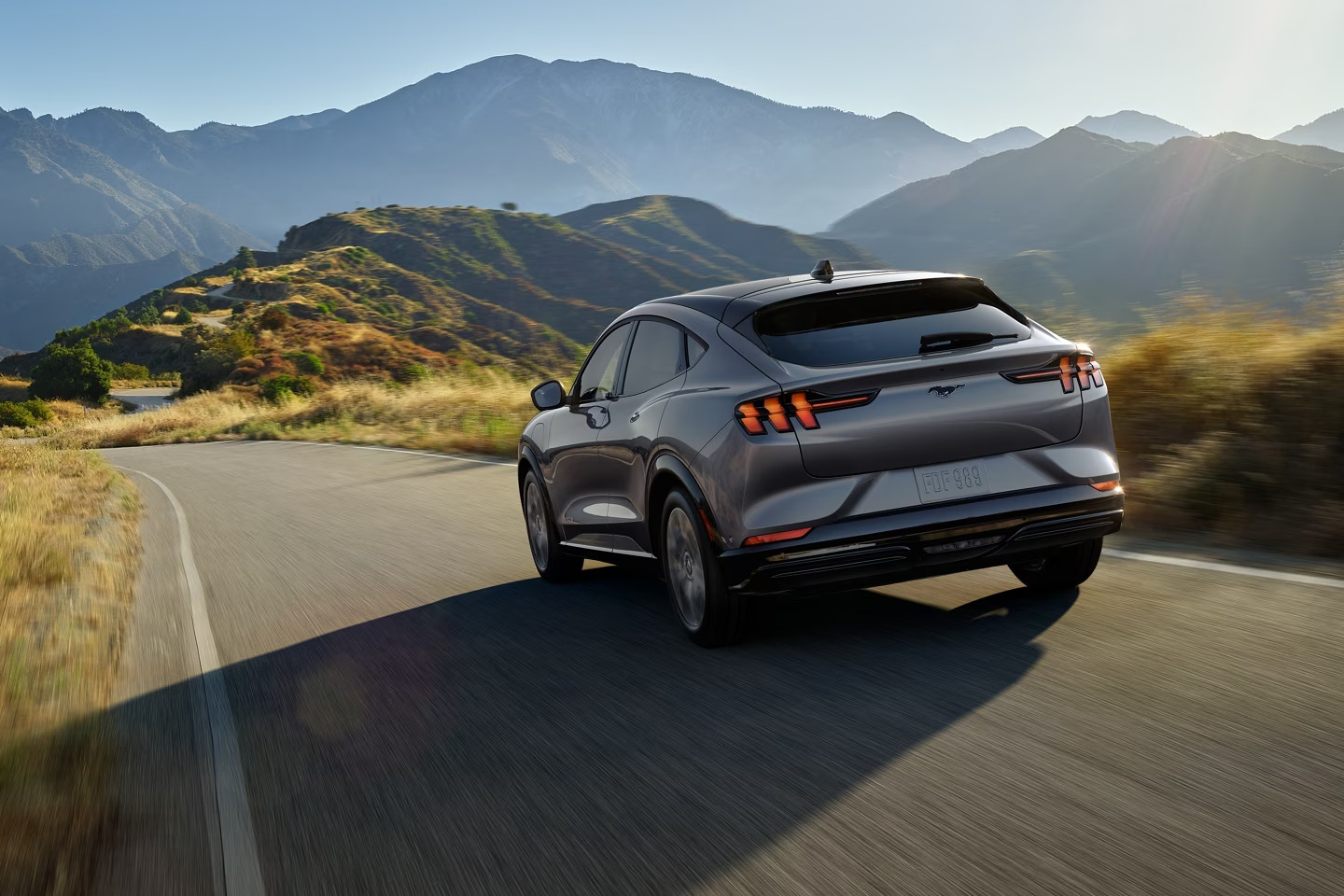 2024 Ford Mach E driving on the hills