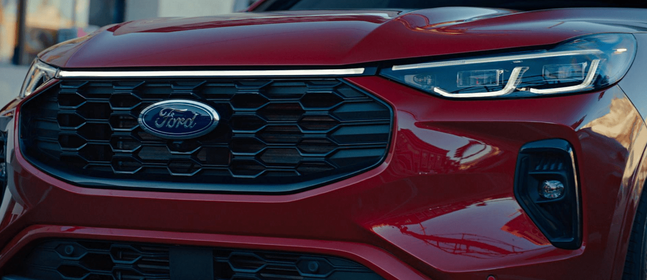 Red Ford Escape ST-Line front grille and headlights highlighted at Waterloo Ford.