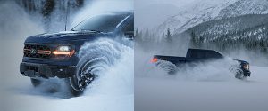 Ford F-150 powering through deep snow in the Alberta Rockies, showcasing winter performance during Waterloo Ford's Edmonton year-end clearance event.