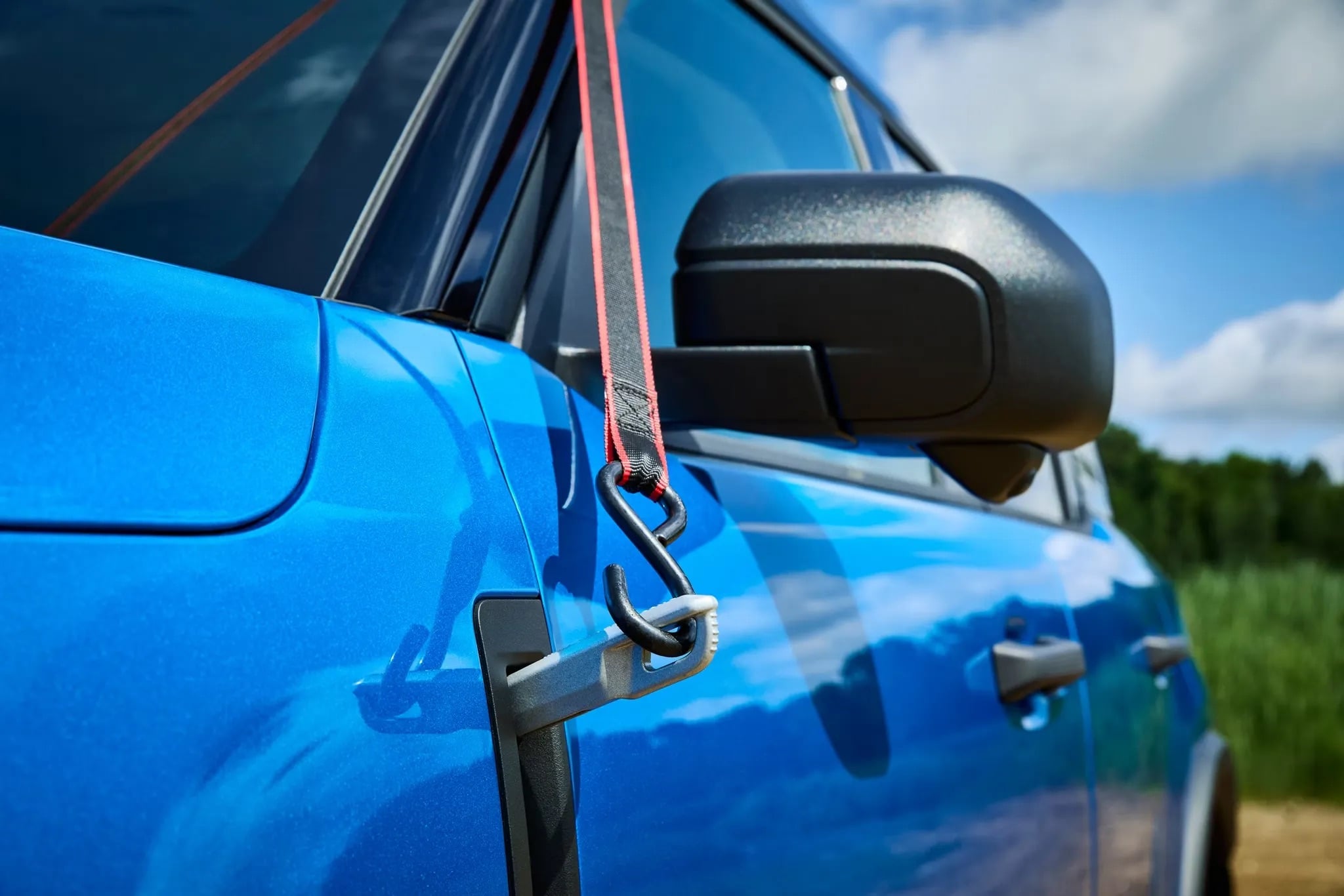 Blue 2026 Ford Bronco Sport parked outdoors with door open
