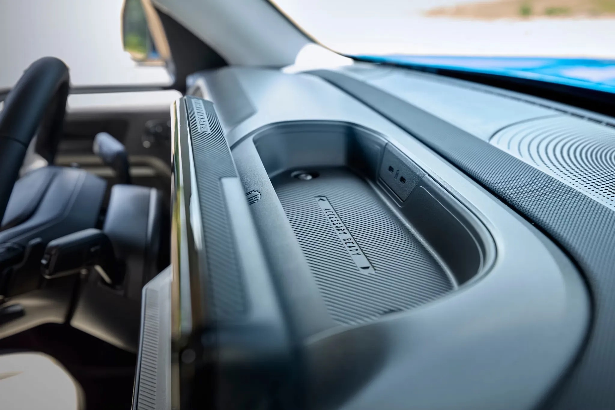 Close-up of interior door trim and handle in a 2026 Ford Bronco Sport