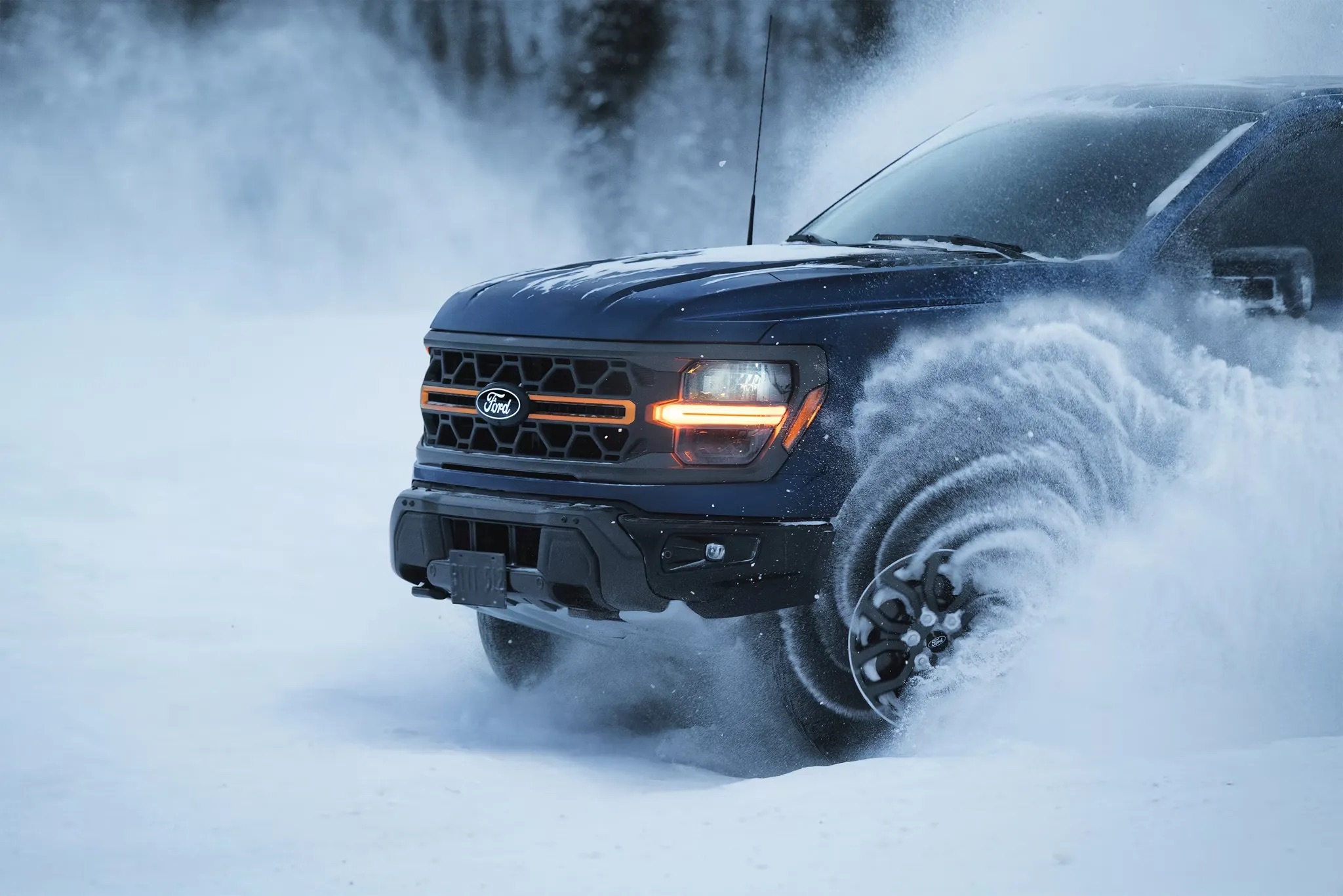 2026 Ford F-150 driving through deep snow in winter conditions