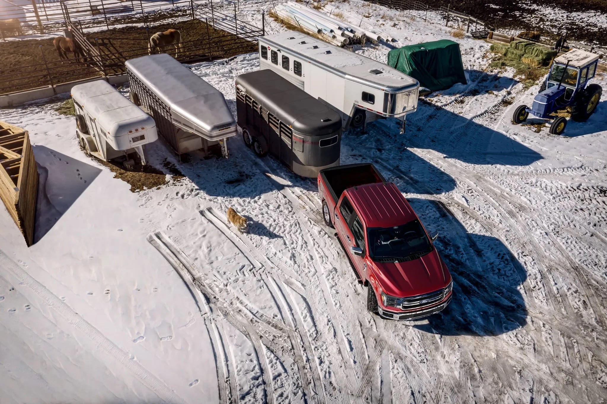 Aerial view of multiple 2026 Ford F-150 trucks parked in snow