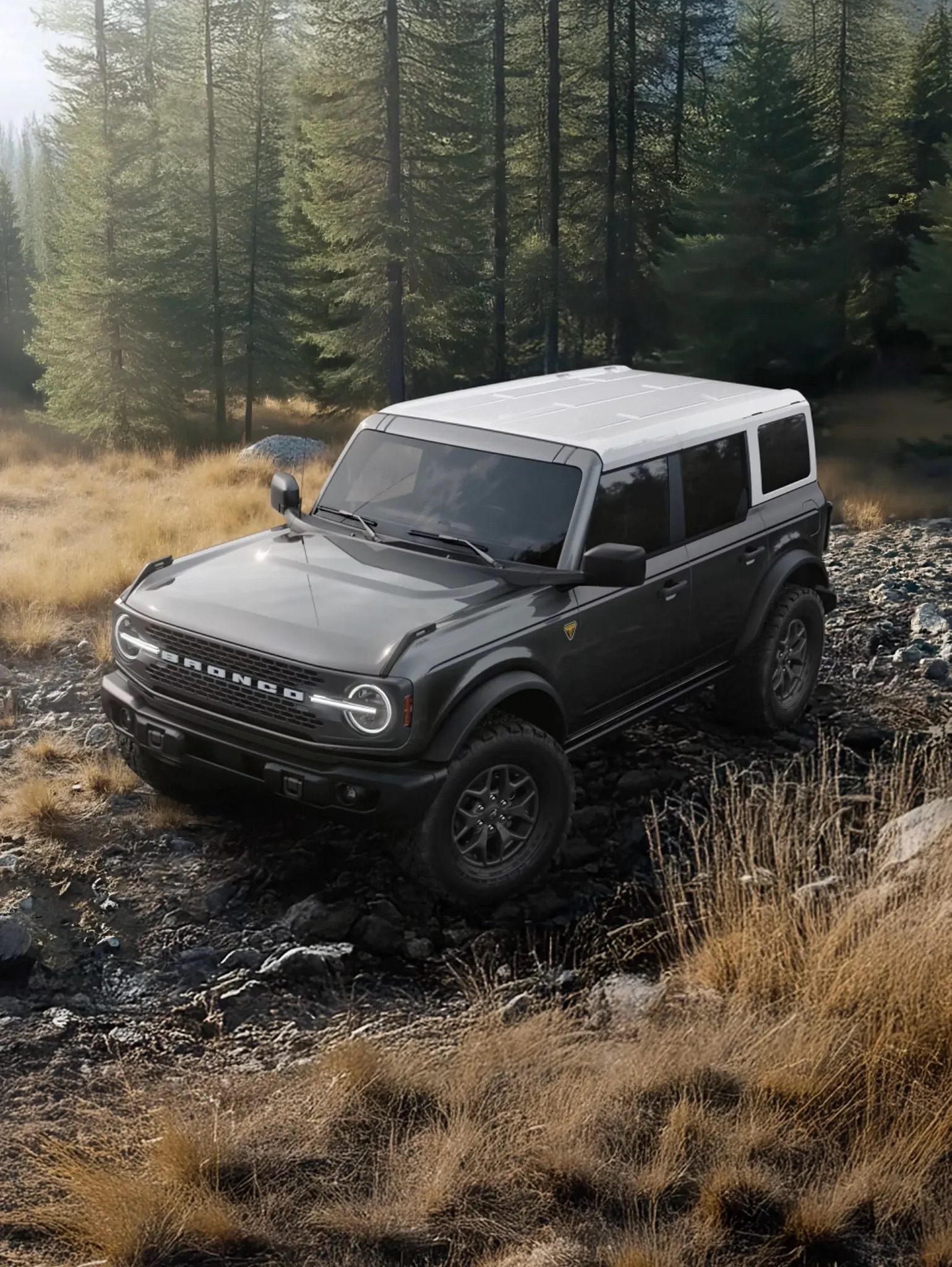 Ford Bronco crossing a shallow creek on a rugged trail, demonstrating its off-road capability with water splashing around the tires.