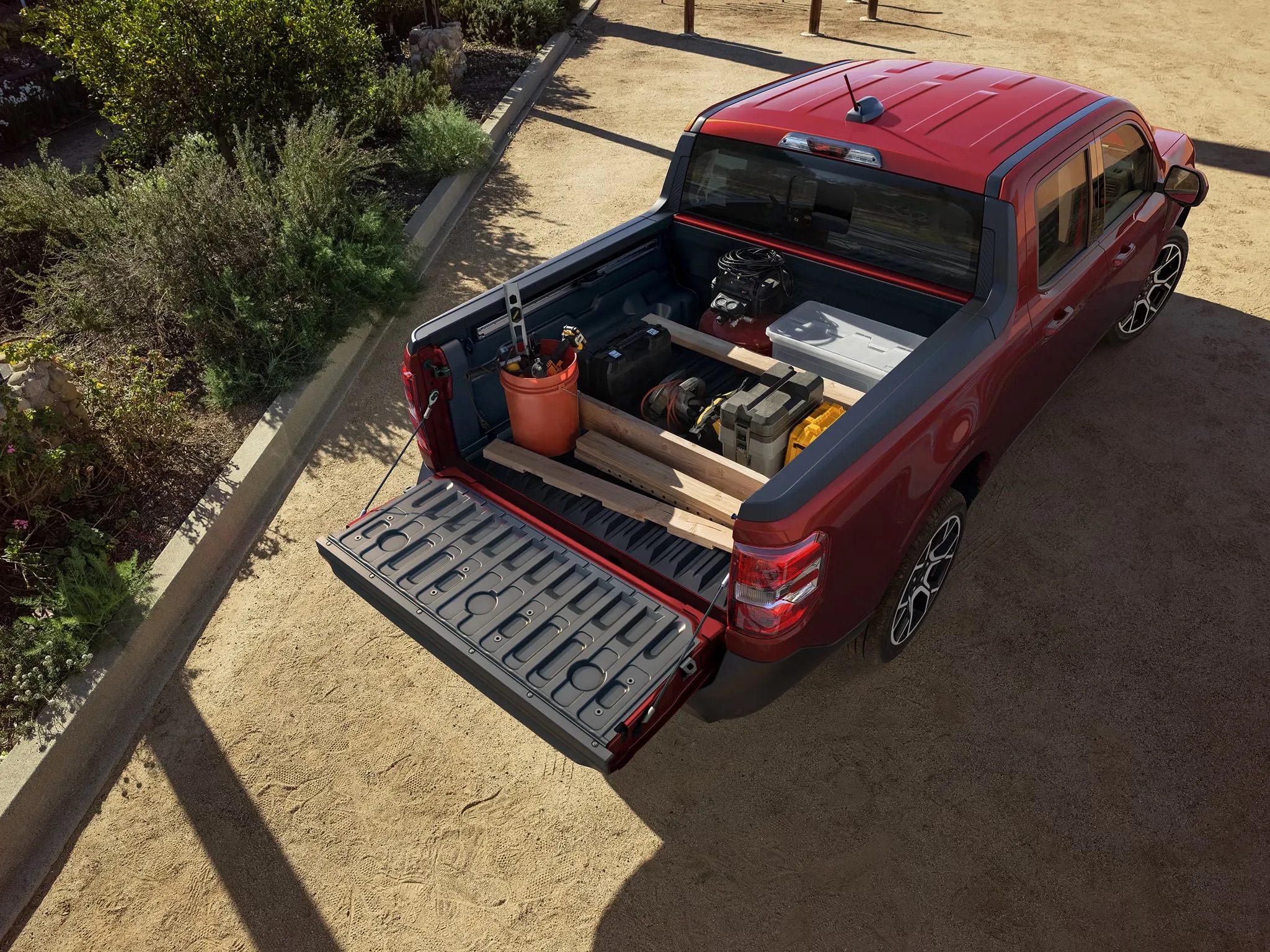 2026 Ford Maverick truck bed with tailgate down showing cargo storage