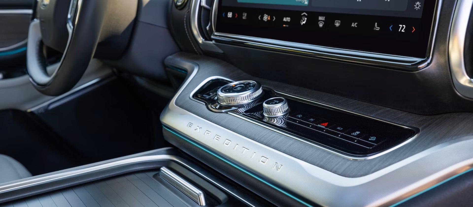 Close-up of the Ford Expedition centre console with storage and climate controls.