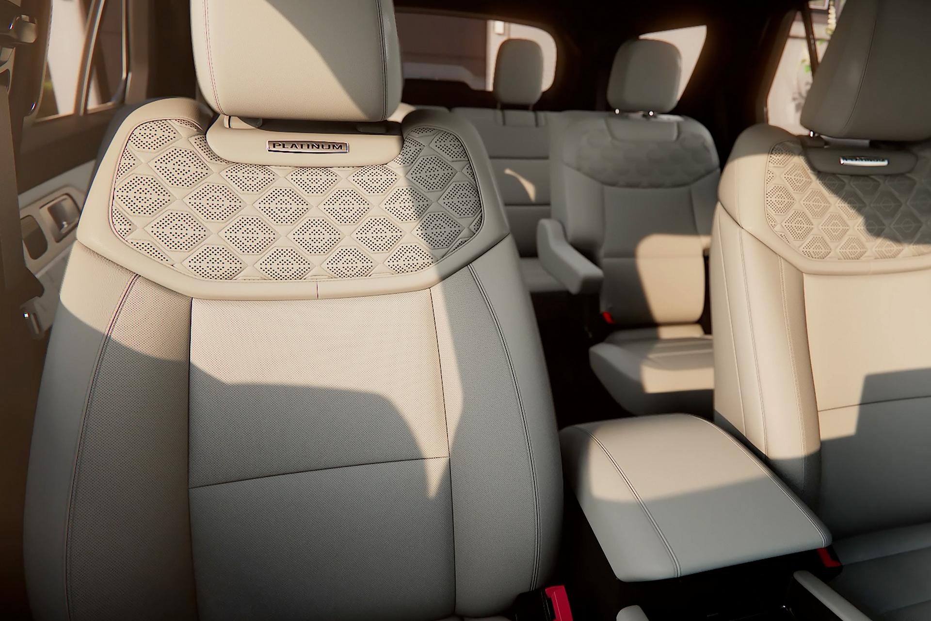 2027 Ford Explorer light-coloured front seats with patterned upholstery and centre console