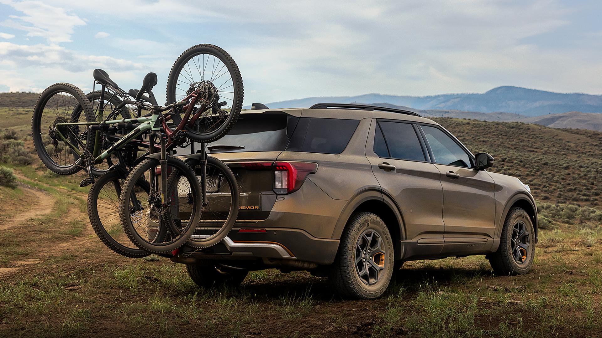 2027 Ford Explorer with bicycles mounted on a rear carrier