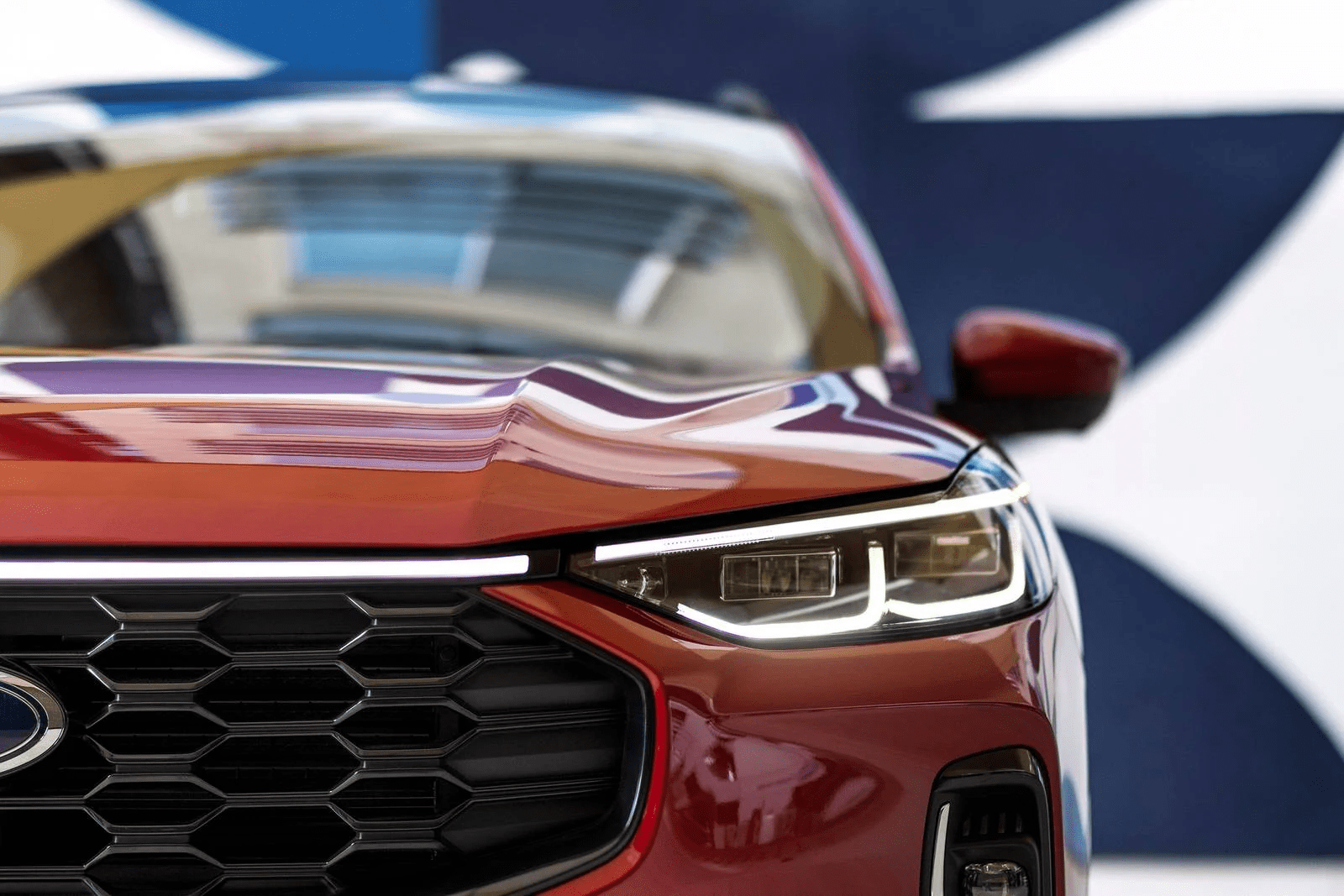 The Ford Escape ST-Line shines in red, built for performance and style.