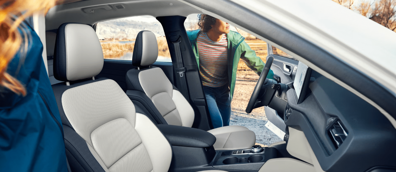 2026 Ford Escape front seats with person going inside.