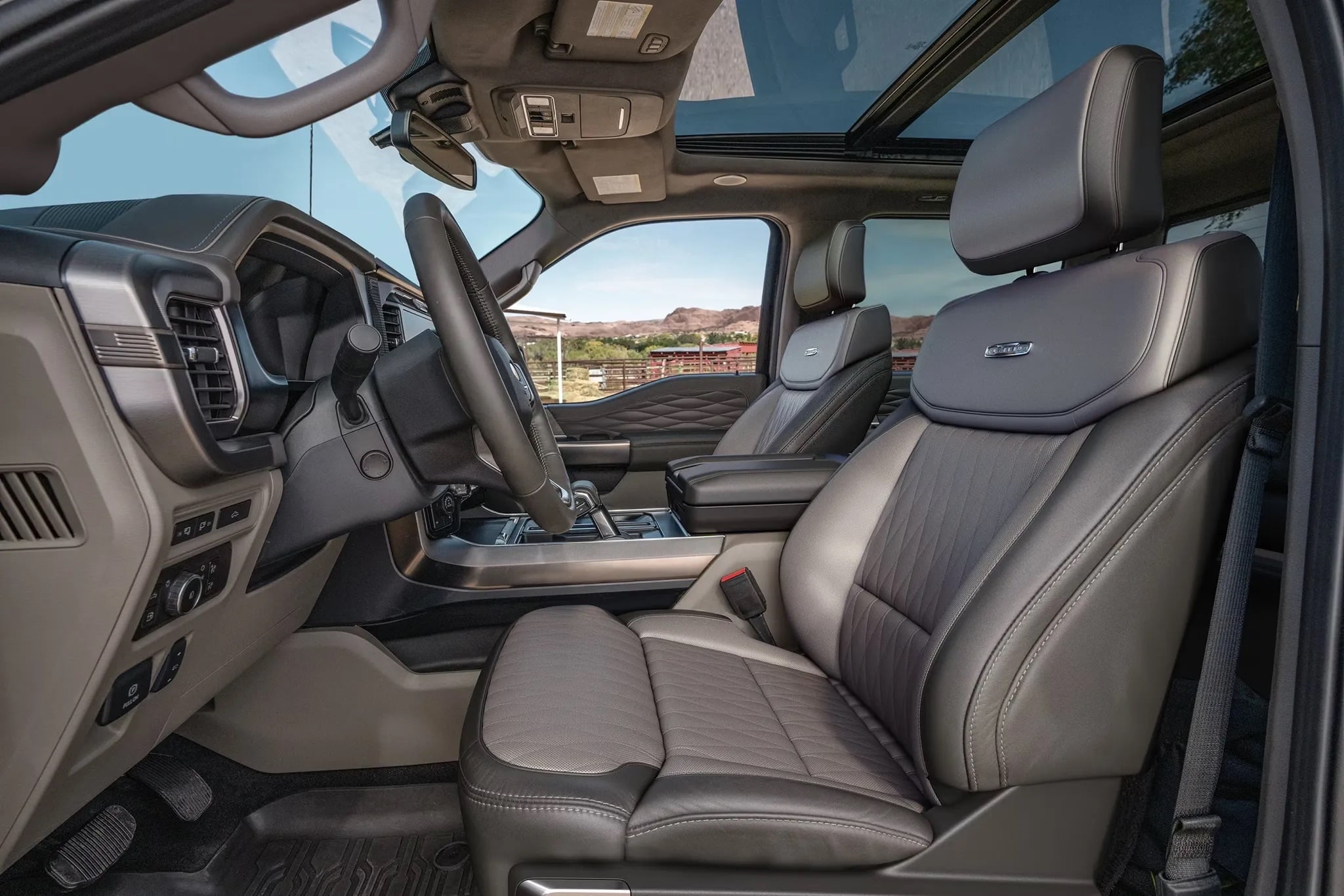 Front interior view of the 2026 Ford F-150 showing seats and dashboard