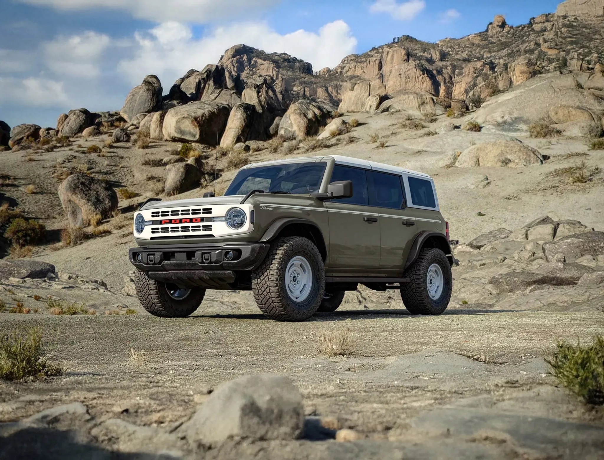 2026 Ford Bronco off road vehicle navigating rocky mountain terrain