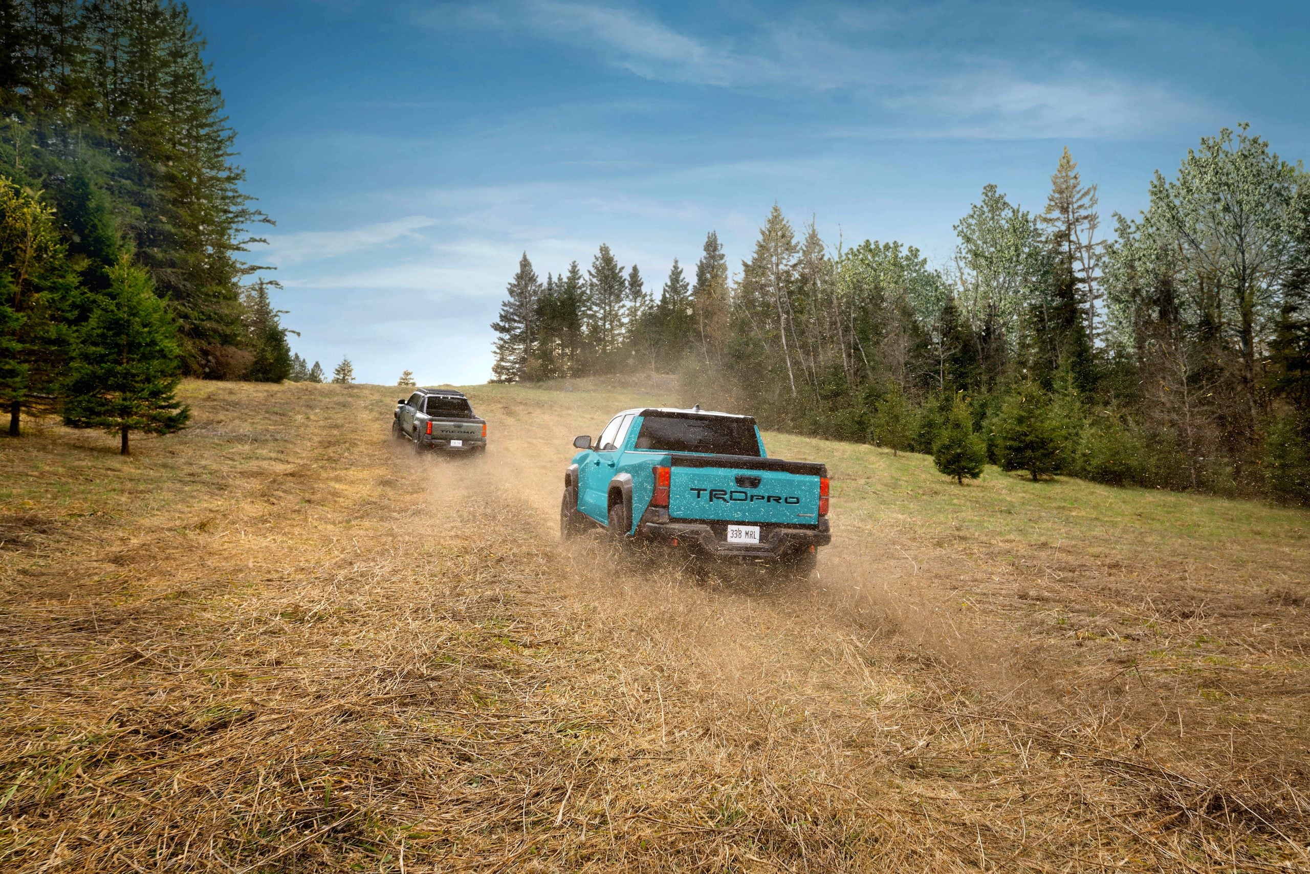 Tacoma Hybrid Trailhunter shown in Bronze Oxide and_Tacoma Hybrid TRD Pro near Ottawa