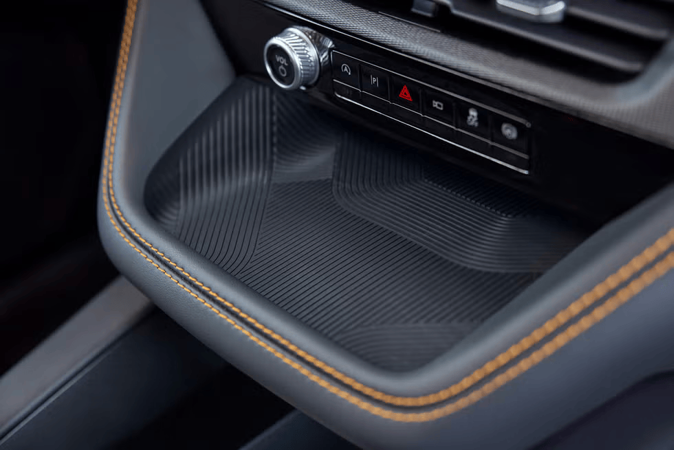 Detail of Ford interior console with textured tray and orange stitching at Barrie Ford.