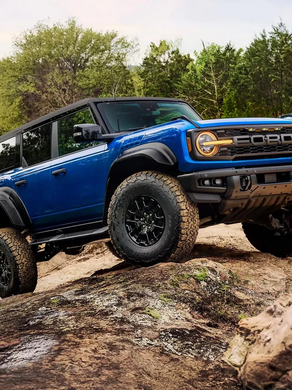 2026 Ford Bronco blue SUV rock crawling off road capability