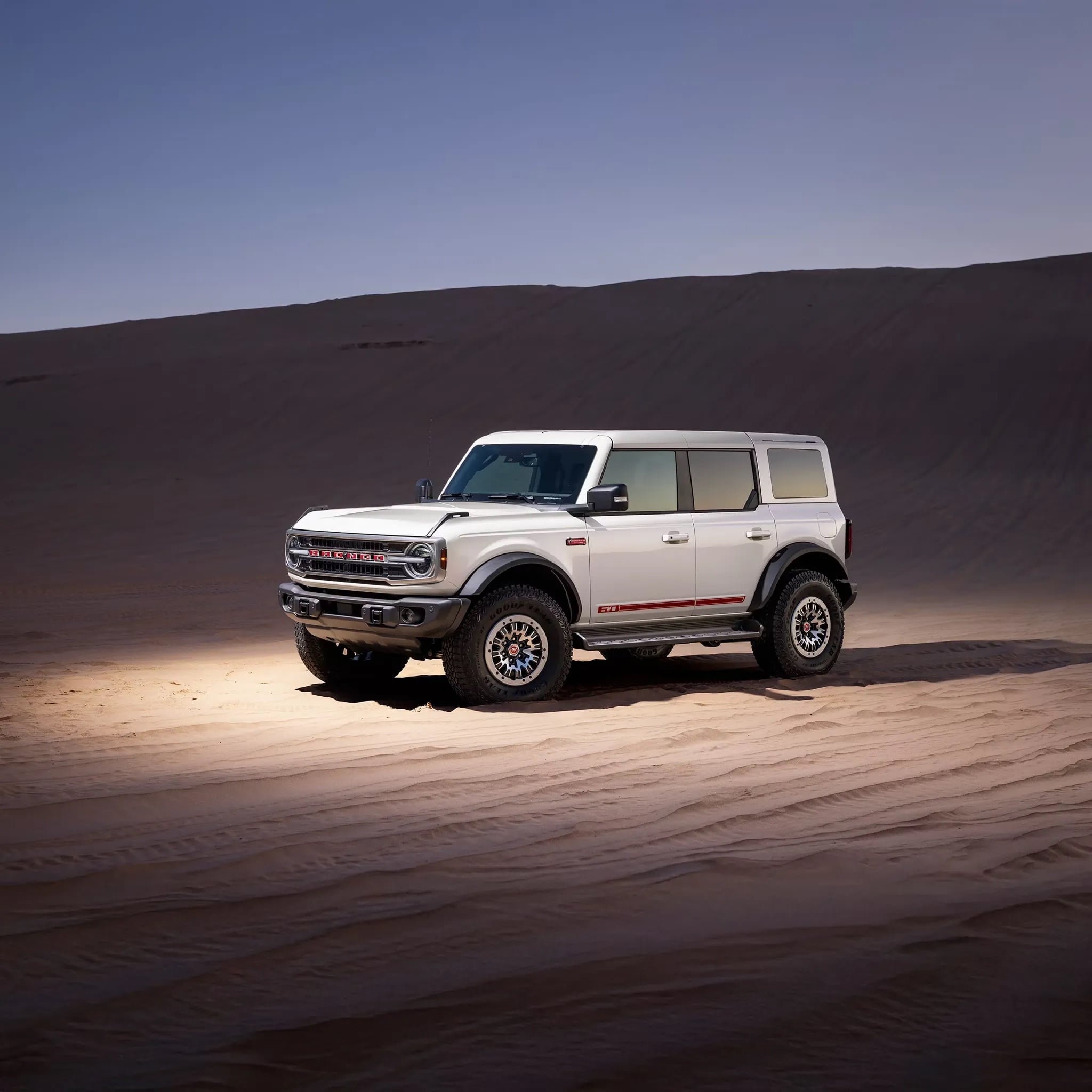 2026 Ford Bronco driving on sand dunes off road capability desert landscape