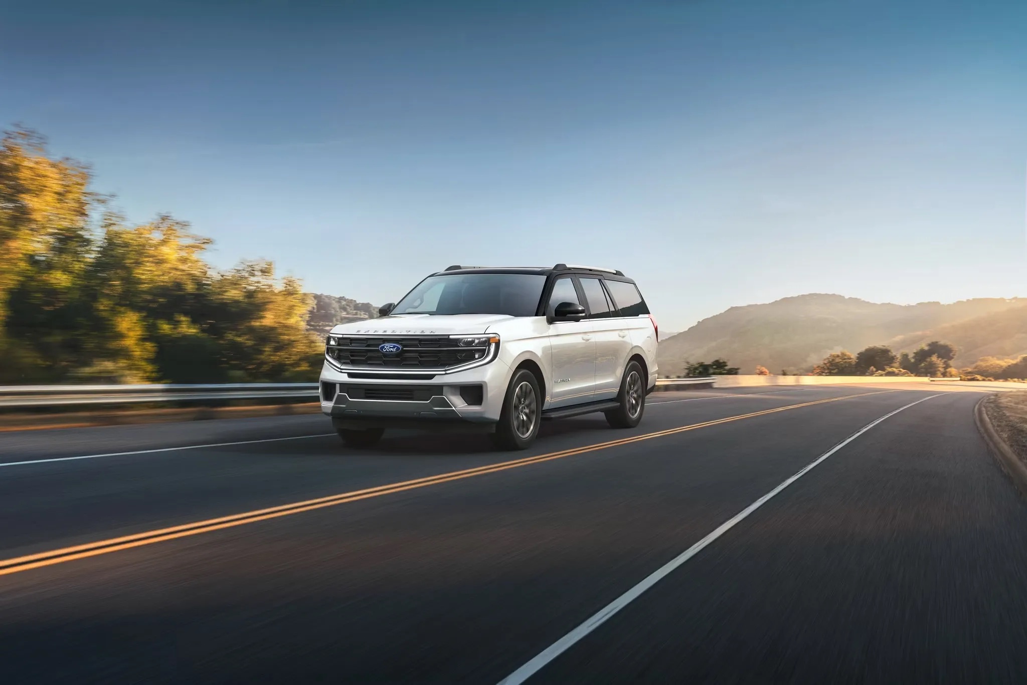 2026 Ford Expedition driving on highway side profile view