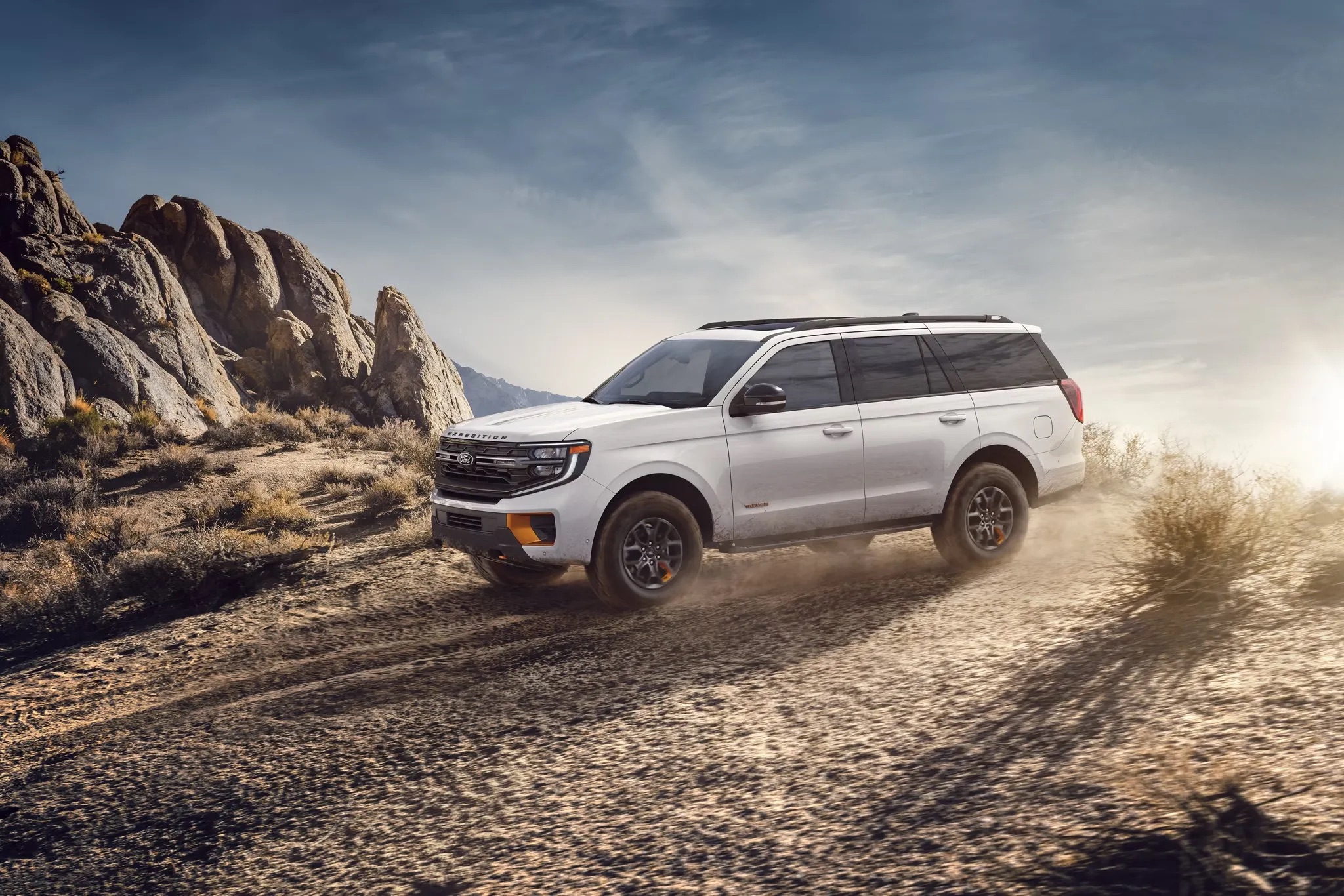 2026 Ford Expedition driving off road on rugged terrain
