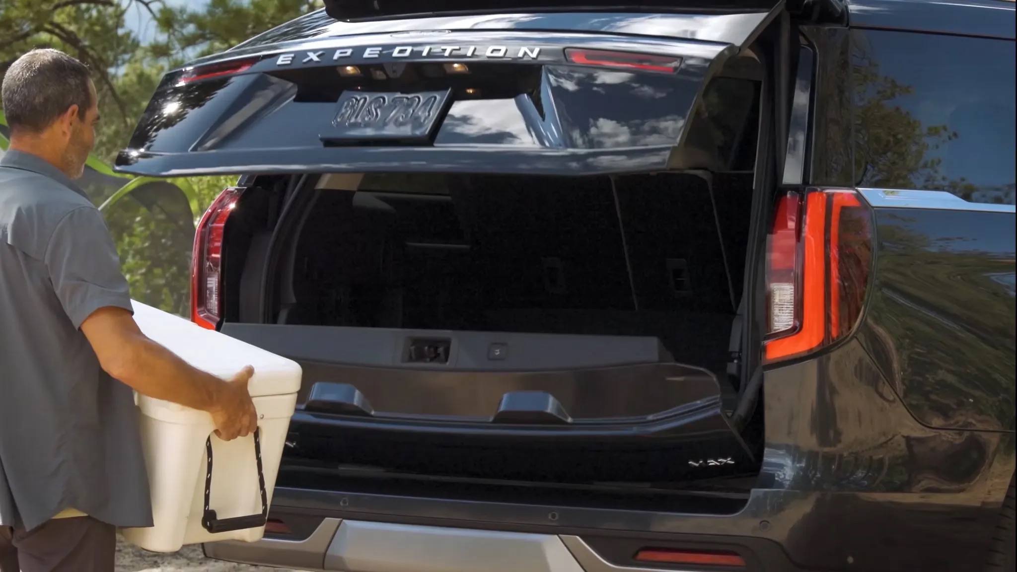 2026 Ford Expedition rear cargo area with tailgate open and storage space