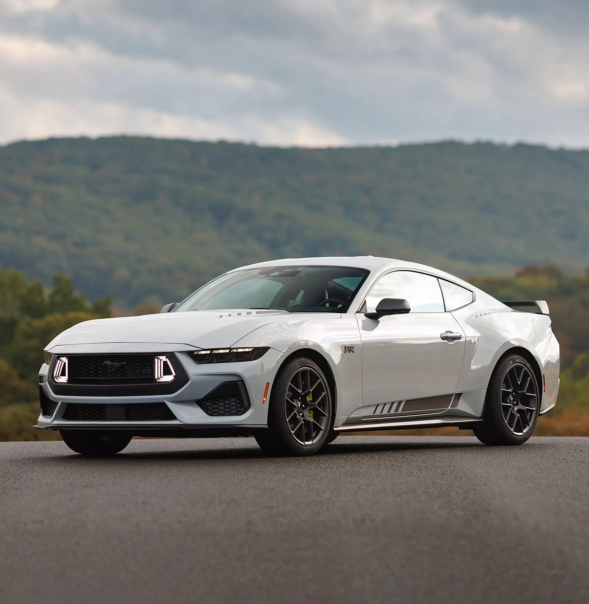 2026 Ford Mustang coupe parked outdoors front three quarter view