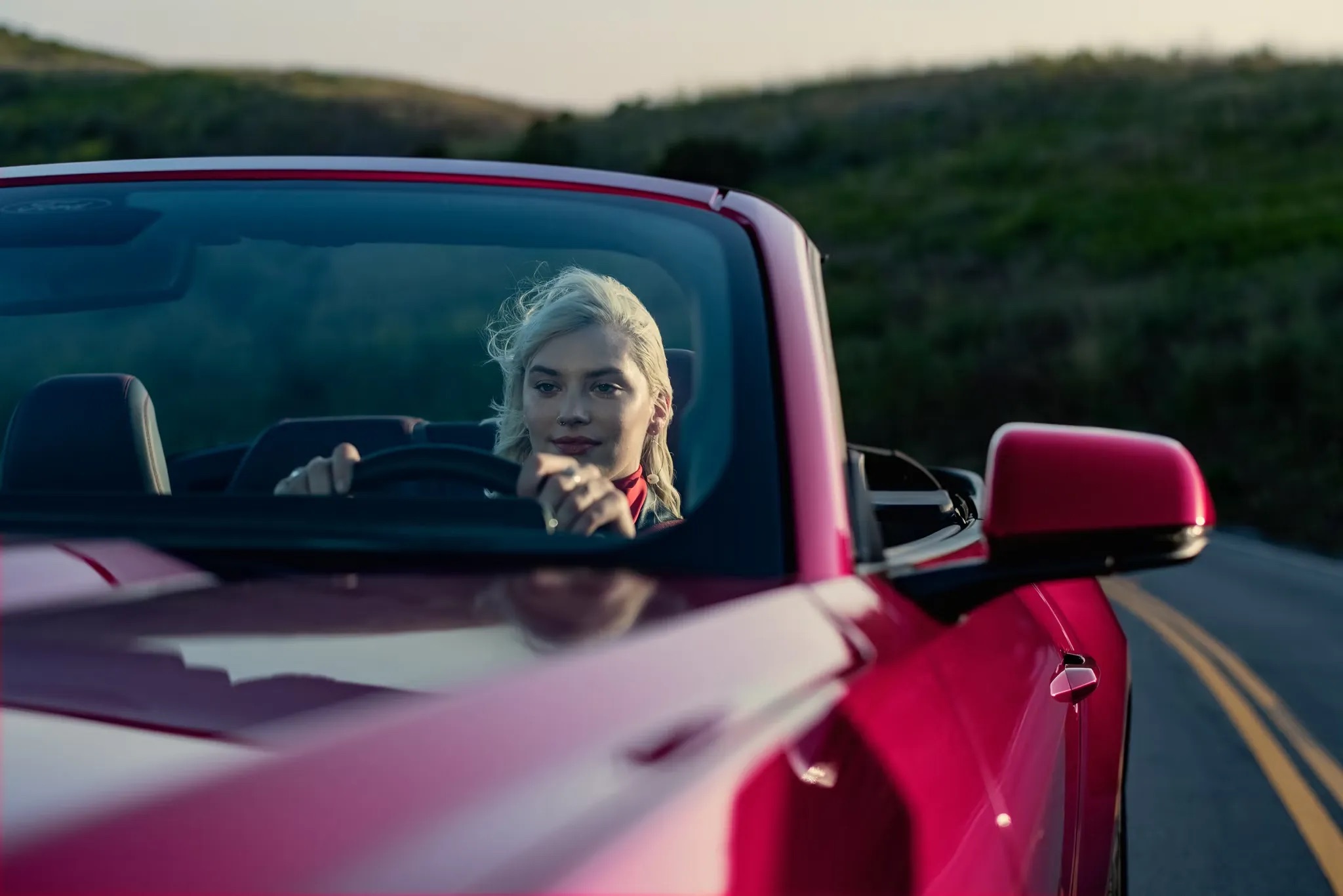 2026 Ford Mustang convertible driver enjoying open air driving experience