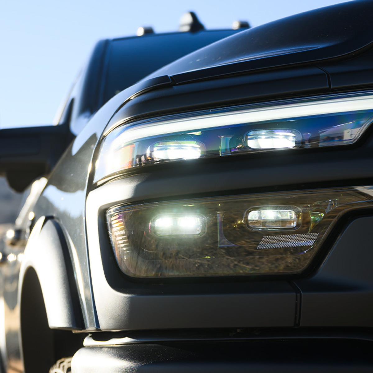 Close-up of 2025 Ram 2500 HD LED headlight assembly with modern multi-light design
