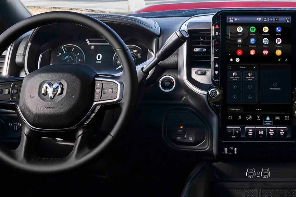 Interior of the 2026 Ram 2500 HD featuring digital touchscreen display and steering wheel with integrated controls