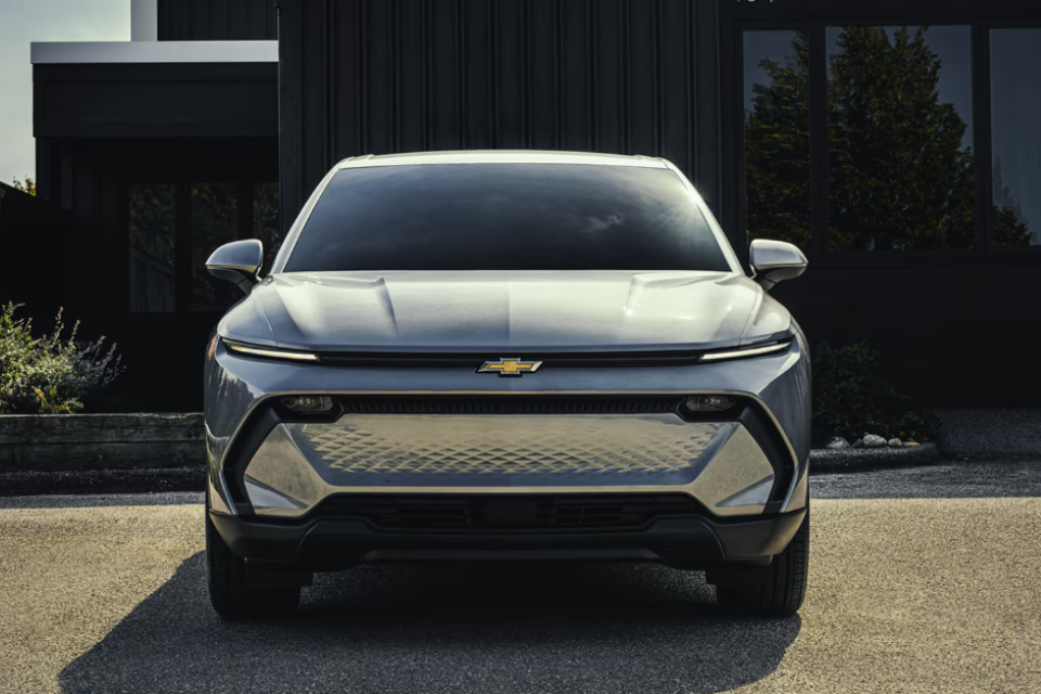 Front view of the 2026 Chevrolet Equinox EV highlighting its bold closed grille and signature LED lighting