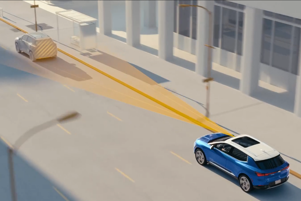 Illustration of the 2026 Chevrolet Equinox EV’s driver-assist technology monitoring the road ahead