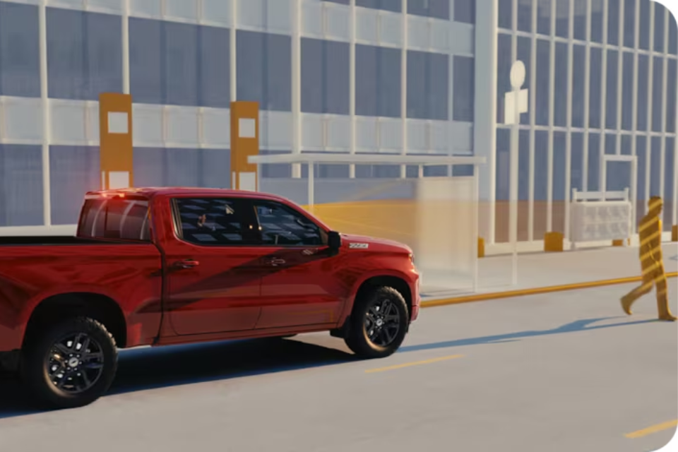 Illustration of the 2026 Chevrolet Silverado 1500 safety technology detecting a pedestrian crossing in front of the truck