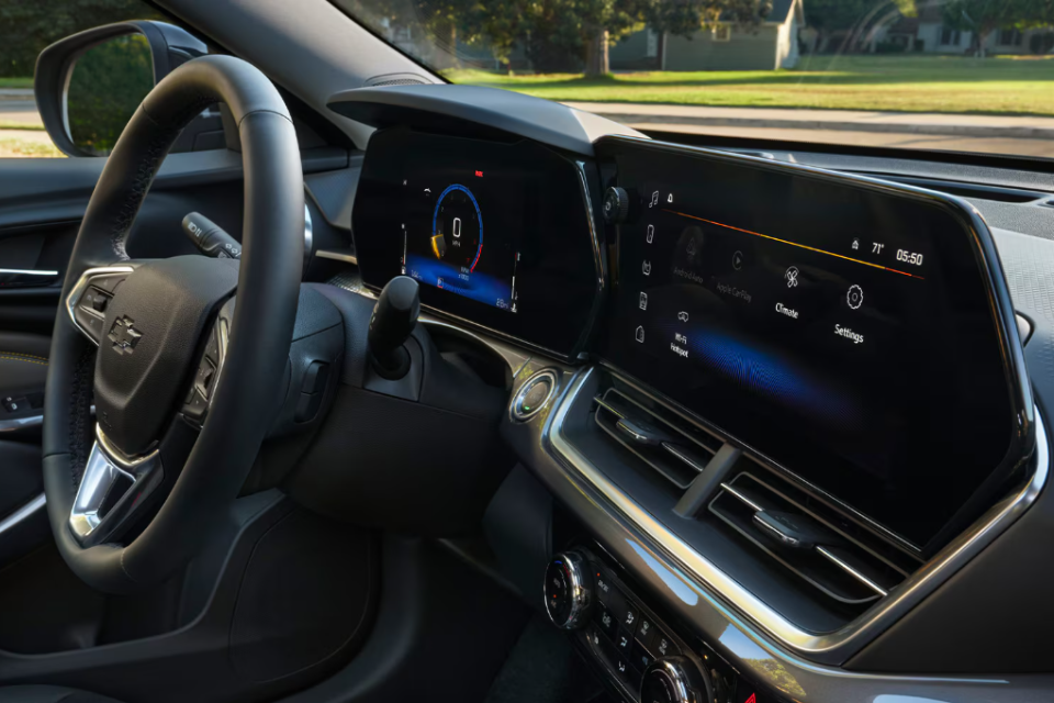 Interior of the 2026 Chevrolet Trax featuring a digital driver display and large touchscreen infotainment system