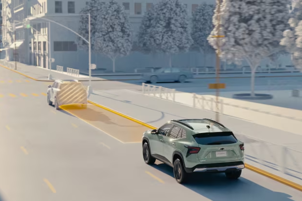 Illustration of the 2026 Chevrolet Trax driver-assist system maintaining a safe distance from the vehicle ahead