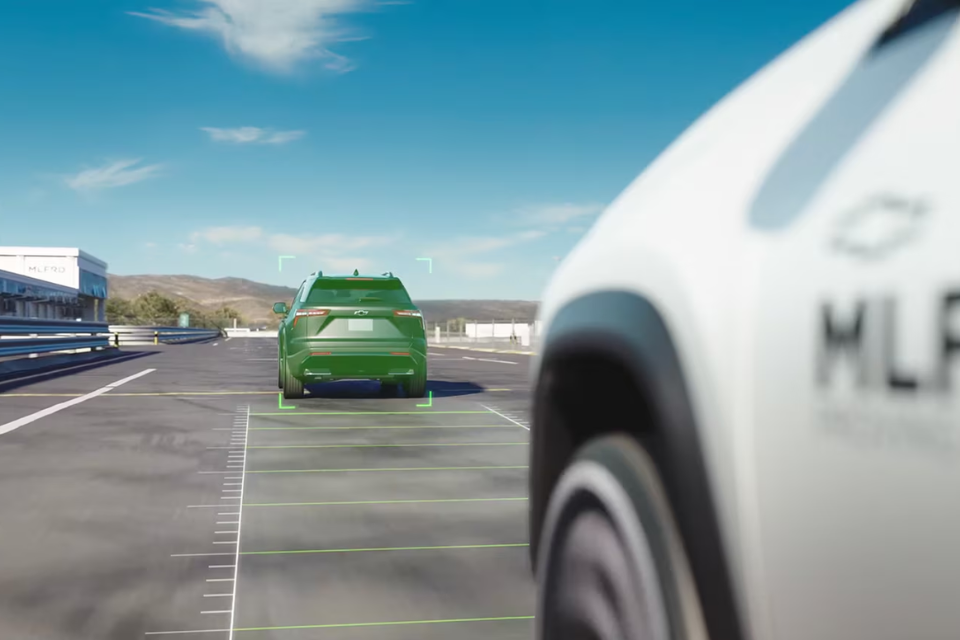 Rear camera safety view display in the 2027 Chevrolet Bolt EV showing vehicle detection graphics